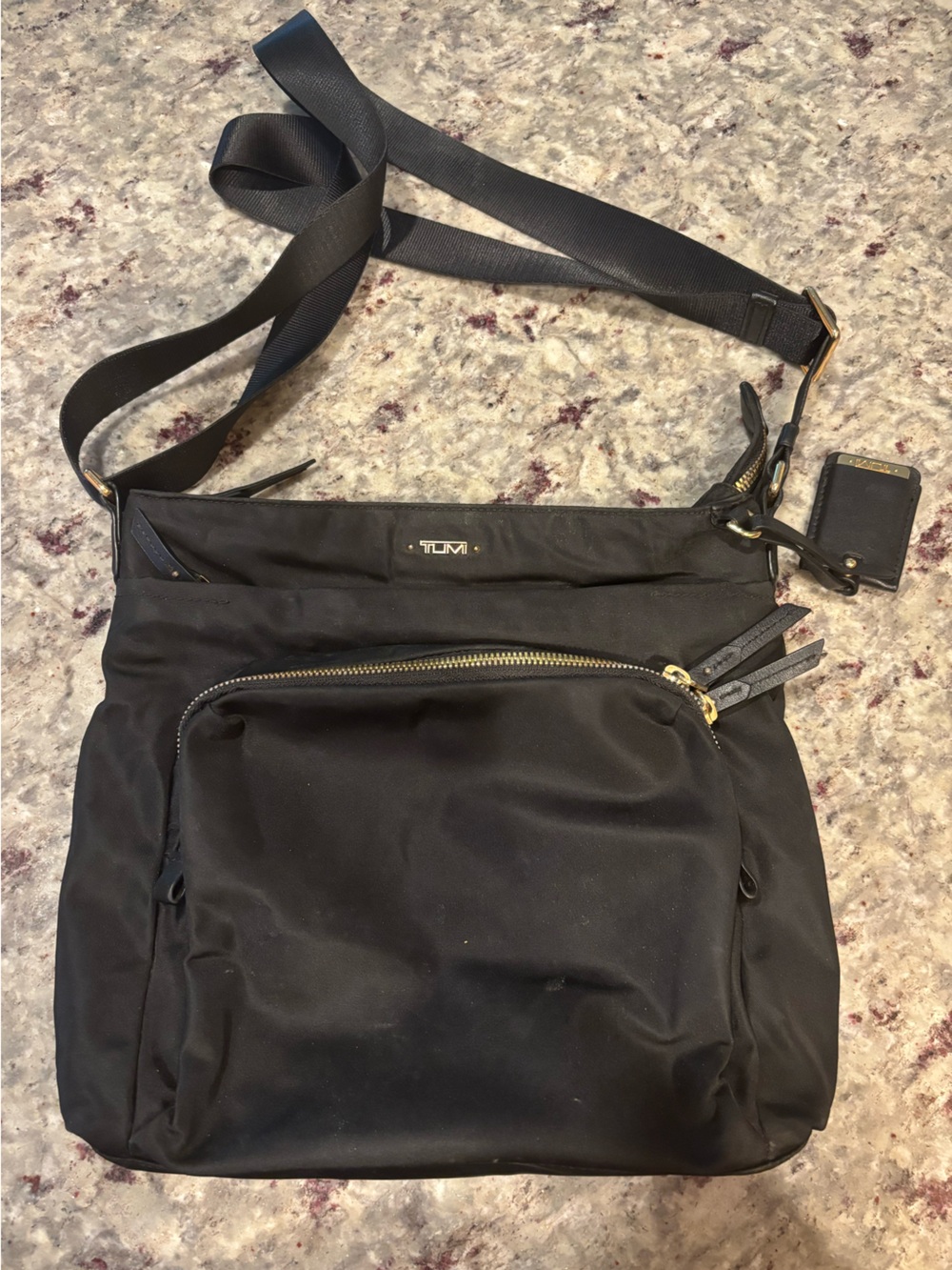 Tumi Black Nylon Crossbody with Gold Accents